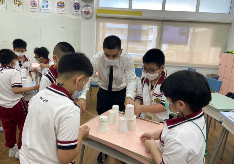 Today was a fun start to the new academic year in primary 3. Students embarked on a team building activity using everyday materials: string, cups, and a rubber band.